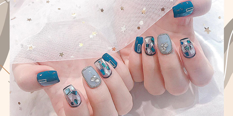 Korean mirror finish nails with festive patterns.
